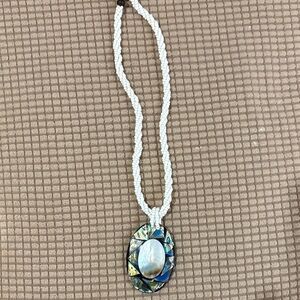 Elegant White Beaded Necklace with Abalone Pendant